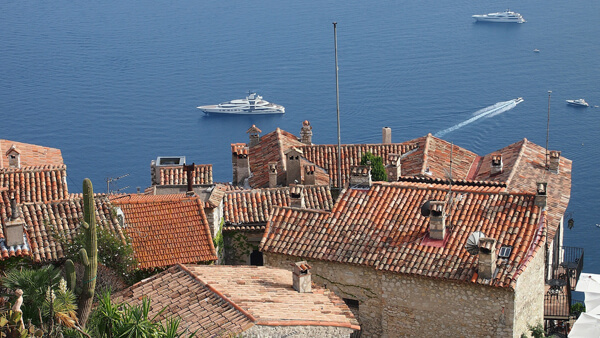 Luxury yacht below Eze Village on the French Riviera