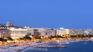 Promenade lights along Cannes beach front at night