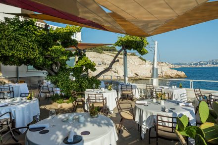 Outdoor dining terrace looking out to sea at Petit Nice Restaurant Marseille