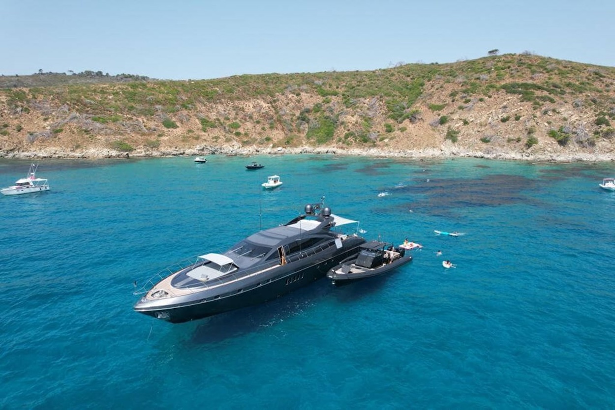At anchor Cap Taillat with chase boat