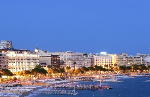 Promenade lights along Cannes beach front at night