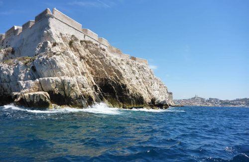 Rocky cliff with waves breaking below, Chateau If Marseille